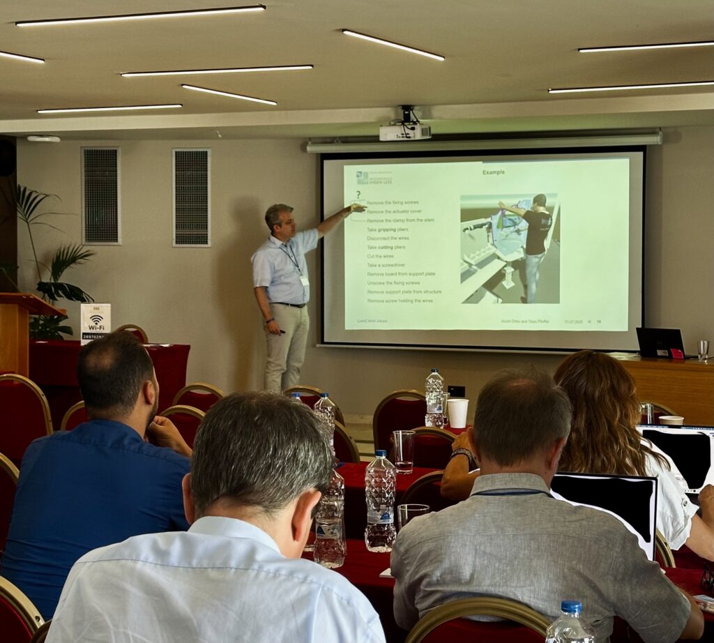 During his talk at the SWI5 workshop, Thies Pfeiffer is explaining the chunking of work instructions on an example shown as a presentation.